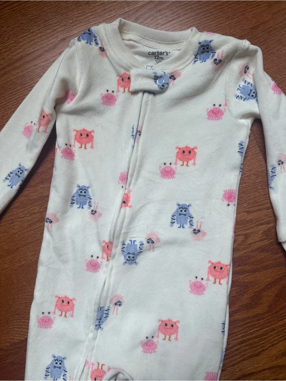 Carter's Cream Footed One-Piece Pajamas with Pink and Blue Monster Print